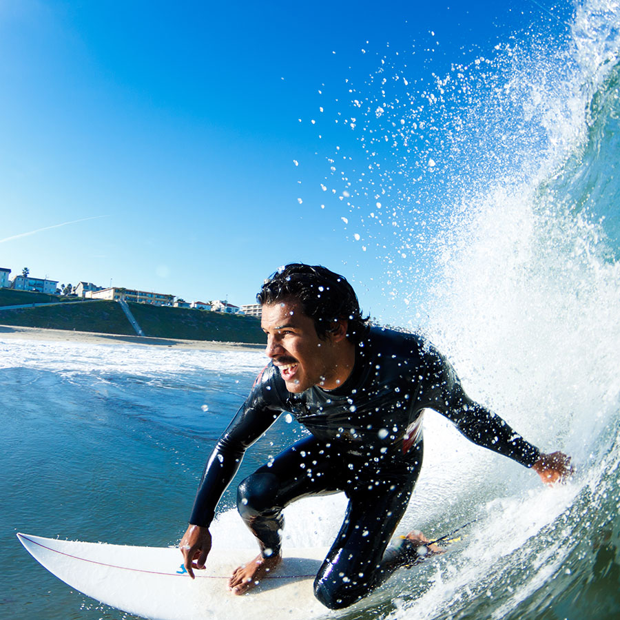 surfer-on-blue-ocean-wave-PWB58YE.jpg